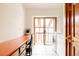 Functional laundry room with ample counter space, washer, dryer, and access to outdoor patio at 14080 Crabapple Rd, Golden, CO 80401