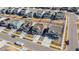 Aerial view showcasing a residential neighborhood with well-maintained lawns and homes, complete with solar panels at 8240 S White Crow St, Aurora, CO 80016