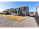 Exterior of home highlighting the backyard and patio at 8240 S White Crow St, Aurora, CO 80016