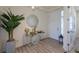 Bright foyer featuring modern decor, tiled floors, and natural light at 8240 S White Crow St, Aurora, CO 80016