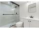 Modern bathroom features tiled walk-in shower, and single sink vanity at 1065 Cobblestone Dr, Highlands Ranch, CO 80126