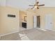 Spacious main bedroom leading into an ensuite bathroom at 1065 Cobblestone Dr, Highlands Ranch, CO 80126