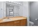 A bathroom features a well-lit vanity, a mirror, and a toilet, providing convenience and functionality at 12711 Colorado Blvd # 1116, Thornton, CO 80241