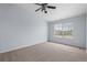 A well-lit bedroom features a ceiling fan and neutral carpeting, offering a calming and spacious atmosphere at 12711 Colorado Blvd # 1116, Thornton, CO 80241