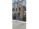Inviting condo entrance showcasing stone accents and well-manicured greenery at 12711 Colorado Blvd # 1116, Thornton, CO 80241