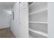 Hallway with closet featuring built in shelves at 12711 Colorado Blvd # 1116, Thornton, CO 80241