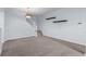 Living room area with staircase and views to other parts of the house at 12711 Colorado Blvd # 1116, Thornton, CO 80241