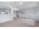 Spacious living room area with staircase and access to other parts of the home at 12711 Colorado Blvd # 1116, Thornton, CO 80241