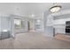Open living space boasts generous windows, patio access, and a modern kitchen nearby at 12711 Colorado Blvd # 1116, Thornton, CO 80241