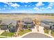 Stunning aerial view of the neighborhood featuring expansive lot sizes and mountain views at 4220 Kestrel Dr, Broomfield, CO 80023