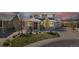 Beautiful two-story home featuring stone accents, manicured lawn, and a welcoming covered porch at 4220 Kestrel Dr, Broomfield, CO 80023