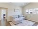 Bright living room offers lots of natural light and comfortable seating at 4220 Kestrel Dr, Broomfield, CO 80023