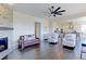 Spacious living room with stone fireplace and open layout at 4220 Kestrel Dr, Broomfield, CO 80023