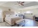 Spacious main bedroom with tray ceiling and bench seating at 4220 Kestrel Dr, Broomfield, CO 80023