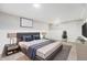 Comfortable bedroom with gray walls, soft carpet, an inviting bed, and closet at 8525 Grandview Ave, Arvada, CO 80002