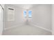 Bright bedroom with carpet flooring and multiple windows at 7210 Watercress Dr, Littleton, CO 80125