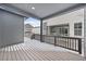 Spacious deck perfect for outdoor entertaining, with snowy view at 7210 Watercress Dr, Littleton, CO 80125