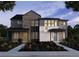 Two-story modern home with stone and siding accents, landscaping, and two-car garage at 7210 Watercress Dr, Littleton, CO 80125
