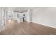 Spacious living room with hardwood floors and access to back patio at 7210 Watercress Dr, Littleton, CO 80125