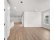 Bright living room with hardwood floors and an open floor plan at 7210 Watercress Dr, Littleton, CO 80125