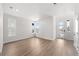 Living room with hardwood floors and lots of natural light at 7210 Watercress Dr, Littleton, CO 80125