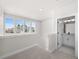 Spacious upper landing with bathroom access and community view at 7210 Watercress Dr, Littleton, CO 80125