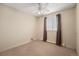 Bedroom with neutral paint and a ceiling fan at 720 S Clinton St # 1B, Denver, CO 80247
