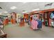 Well stocked pro shop with golf apparel, golf clubs, and accessories displayed at 720 S Clinton St # 1B, Denver, CO 80247