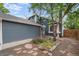 A beautiful two-story home featuring a well-manicured front yard and inviting entrance at 13341 Birch Cir, Thornton, CO 80241