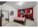 Unique bedroom with bright accent wall, mirror, and playful decor at 1126 S Davenport Ct, Erie, CO 80516