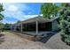 A charming green home boasts a large covered back patio, ideal for outdoor relaxation and entertaining at 5986 Dunraven St, Golden, CO 80403