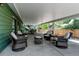 Covered patio featuring comfortable outdoor seating arrangements at 5986 Dunraven St, Golden, CO 80403