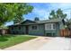 Single Gathering home with an inviting front porch, bay window, and landscaped yard at 5986 Dunraven St, Golden, CO 80403