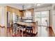 Well-appointed kitchen featuring a central island, stainless steel appliances, and a convenient layout at 5986 Dunraven St, Golden, CO 80403
