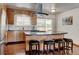 Bright kitchen featuring stainless steel appliances, a gas cooktop, and ample counter space at 5986 Dunraven St, Golden, CO 80403