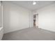 Clean bedroom featuring carpeted floors, a ceiling fan, and an open doorway at 1616 S Broadway # 206, Denver, CO 80210