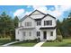 Two-story home with white siding, black accents, and a covered porch at 1238 Penner Dr, Erie, CO 80026