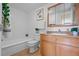 An efficient bathroom features a tub, toilet, vanity and a mirror cabinet at 1196 N Grant St # 407, Denver, CO 80203