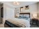 Inviting bedroom with stylish decor, plush bedding, and a well-lit ambiance at 1519 S Dayton St, Denver, CO 80247