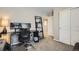 Bright home office equipped with dual monitors, a comfortable chair, and a storage ladder at 1519 S Dayton St, Denver, CO 80247