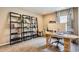 Well-appointed office space featuring natural light, custom shelves, and stylish decor at 1519 S Dayton St, Denver, CO 80247