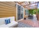Charming outdoor patio with a comfortable seating area and a pergola for shade at 1519 S Dayton St, Denver, CO 80247