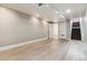 Spacious basement with stairs leading to the main level and two interior doors at 2731 S Pearl St, Englewood, CO 80113