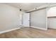 Finished basement with neutral walls and luxury vinyl flooring, plus ample space at 2731 S Pearl St, Englewood, CO 80113
