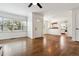 Bright living room features hardwood floors, large windows and a door leading to the exterior at 2731 S Pearl St, Englewood, CO 80113