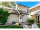 Charming home exterior with a beige facade, landscaped yard, and inviting front entrance at 2101 S Victor St # C, Aurora, CO 80014