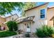 Charming home exterior with a beige facade, landscaped yard, and inviting front entrance at 2101 S Victor St # C, Aurora, CO 80014