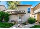 Charming home exterior with a beige facade, landscaped yard, and inviting front entrance at 2101 S Victor St # C, Aurora, CO 80014