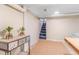 Partially finished basement with stairway at 4476 S Lincoln St, Englewood, CO 80113