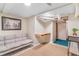 Finished basement with a cozy seating area and a built-in desk at 4476 S Lincoln St, Englewood, CO 80113